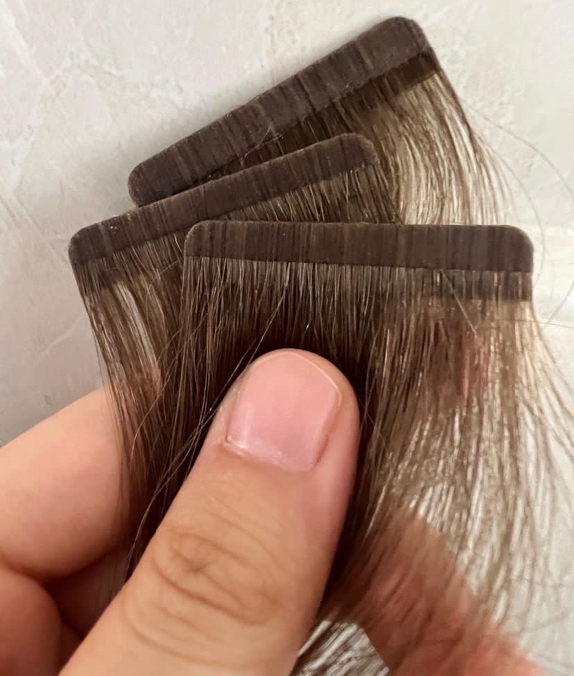 Regular100% remy SEAMLESS TAPE cuticle intact double drawn, product view 1